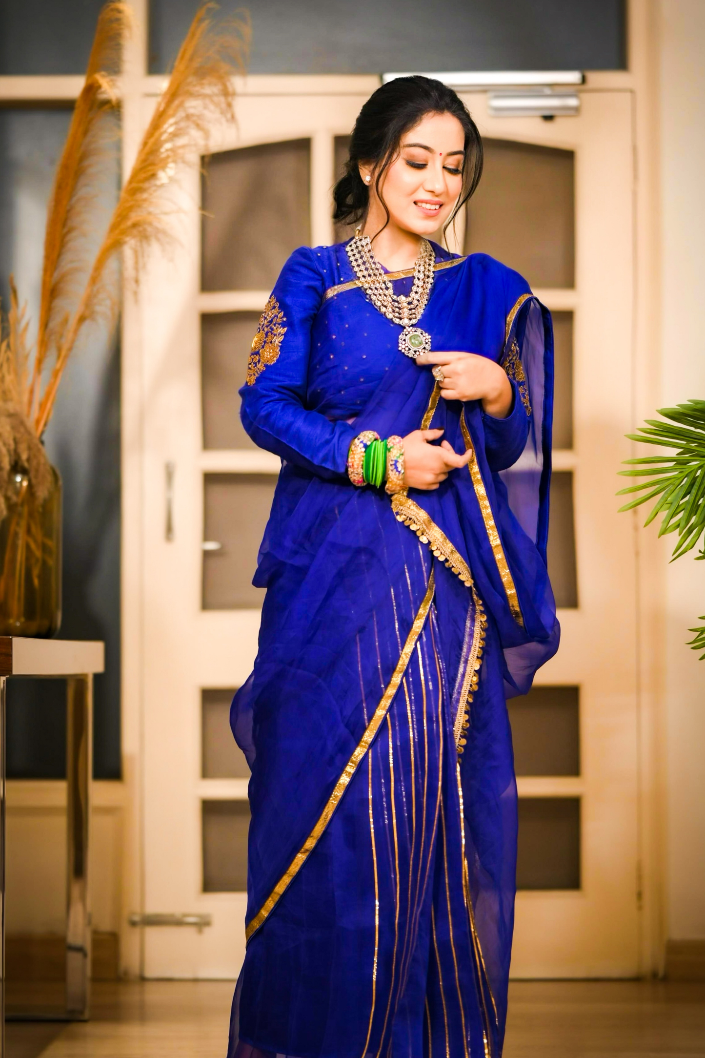 Neeltara Magnetic Blue Embroidered Saree Set